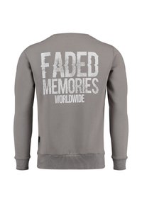 Felpa grigia con maniche lunghe, polsini e orlo a costine. Presenta una grande stampa bianca usurata con la scritta "FADED MEMORIES WORLDWIDE" sul retro.