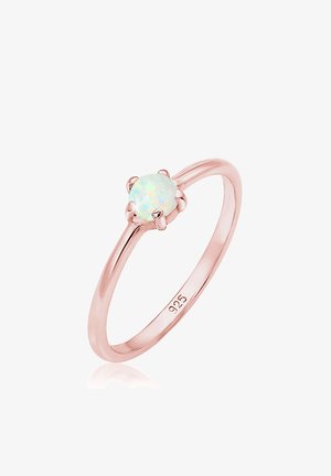 Rings aus Roségold mit einem runden Opalstein in einer sechszackigen Fassung. Der Band ist schlank und poliert, markiert mit '925' für den Silbergehalt.