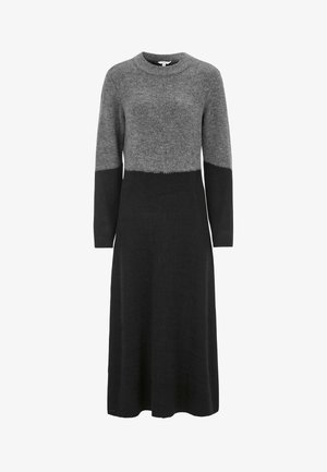 Knit dress with a round neckline, featuring a gray upper section and a black lower section. Long sleeves, soft texture, and mid-calf length.