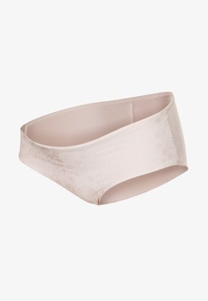 Nude-kleurige slip gemaakt van soepel materiaal, met een subtiel cirkelpatroon, een lage taille en gemiddelde dekking aan de zijkanten.