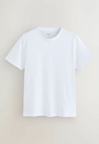 T-shirt blanc uni à manches courtes, coupe slim, col rond, taille moyenne, présenté sur un fond clair.