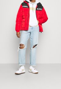 Karl Kani Giacca invernale - black