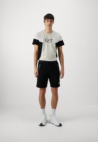 EA7 Emporio Armani Pantaloni sportivi - nero