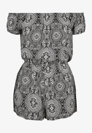 Combinaison à bretelles dénudées noire et blanche à motifs, avec une taille élastique et des jambes courtes, ornée de motifs floraux et paisley complexes.