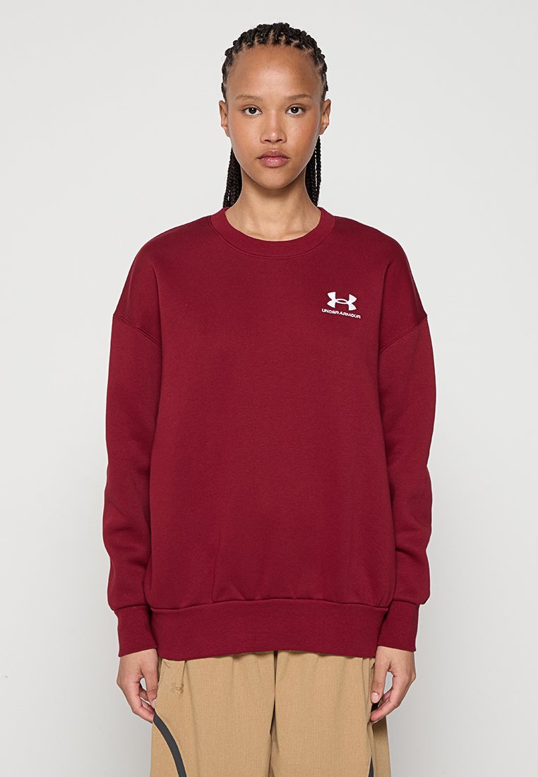 Bordeauxfarbener Sweatshirt mit rundem Halsausschnitt, langen Ärmeln und gerippten Bündchen. Verfügt über ein kleines weißes Under Armour-Logo auf der Brust. Weicher Stoff.