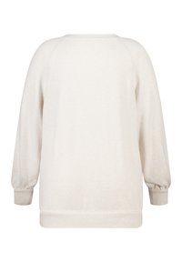 Crème-kleurig sweatshirt met een relaxed fit, raglanmouwen en ribgebreide manchetten. Zachte textuur zonder zichtbare patronen of hardware.