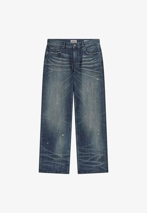 Losse, vervaagde blauwe denim jeans met versleten accenten, zichtbare stiksels, vijf zakken en een ritssluiting.