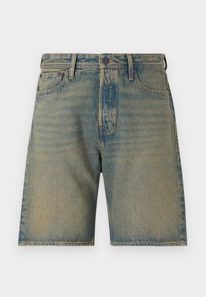 Lichte blauwe denim shorts met een vervaagde wassing. Bevat vijf zakken, een ritsopening, knoopsluiting en stevige stiksels langs de randen.