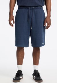 LOGOSTICKEREI - Pantaloni sportivi - blau