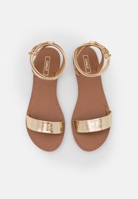ONLY SHOES Varrelliset sandaalit - gold-coloured
