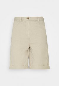 Béžové šortky vyrobené z bavlněné směsi, s předním zapínáním na knoflík, dvěma bočními kapsami a ohrnutými lemy pro uvolněný design.