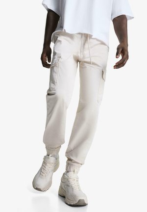 JOGGERS - Pantaloni cargo - sand