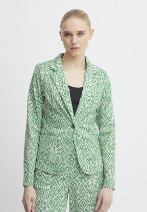 Green and white patterned blazer with a structured design, featuring a notch lapel, two front pockets, and a single button closure.