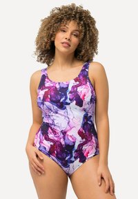 Yhdisteiden kukkakuviollinen värikäs haalariasu, jossa on violetteja, vaaleanpunaisia ja sinisiä sävyjä. Asu on valmistettu joustavasta ja sileästä kankaasta, jossa on leveät olkaimet.