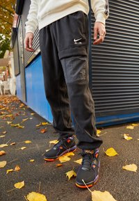 Nike Sportswear - AIR WINTER PANT - Cargohose - black/white Thumbnail-Bild 1