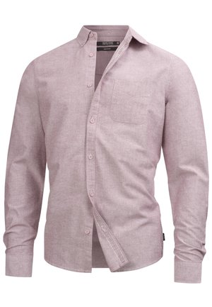 Long-sleeve shirt in light pink fabric with a button-down collar, a chest pocket, and subtle texture; features matching buttons along the front.
