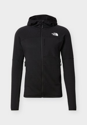 Μαύρο μπουφάν με κουκούλα και πλήρη φερμουάρ, μακριά μανίκια, τσέπη στο στήθος και το λογότυπο The North Face στο επάνω αριστερό μέρος του στήθους.