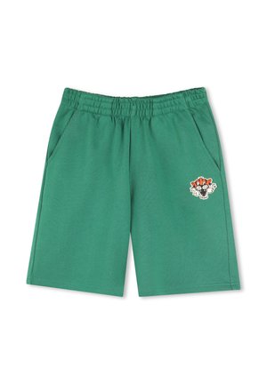 Green cotton shorts with an elastic waistband, two side pockets, and a tiger graphic patch on the left leg. Smooth, casual design.