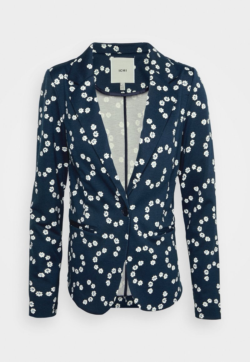 Blazer ajusté bleu marine avec motif floral blanc, revers crantés, fermeture à un bouton et deux poches passepoilées à l'avant.