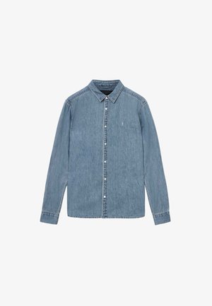 Lyseblå denimskjorte med lange ærmer, knap-tryk krave og knaplukning foran. Har et lille dekorativt logo på brystet.