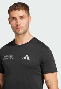 adidas Performance ULTIMATE METALLIC GRAPHIC - Camiseta deportiva - black
