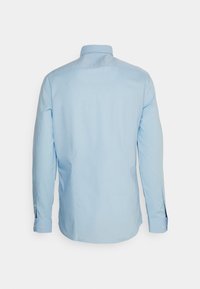 Tommy Hilfiger Tailored SOLID SHIRT - Camisa formal - custom color light blue