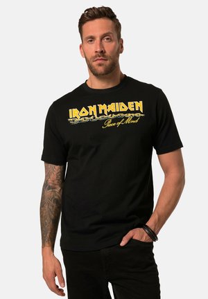 Sort bomulds t-shirt med "IRON MAIDEN" i gul tekst med et kæde-design. Kortærmet og med klassisk rund hals.