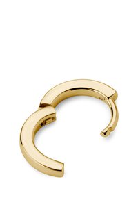 Gullfarget mansjettarmbånd med en glatt, blank overflate. Har et unikt buet design og en lås for sikker lukking.