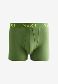 Zöld pamut boxeralsó arany "NEXT" logóval az elasztikus deréknál. Fitt fazon és sima textúra jellemzi.