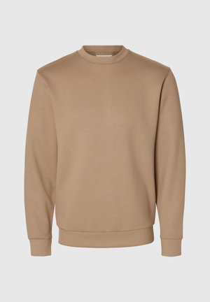 Beige crewneck sweatshirt made of soft material. Features long sleeves, a ribbed neck, and fitted cuffs. Plain design without patterns.