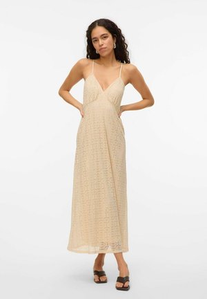 Maxi jurk met een v-halsontwerp, gemaakt van kantachtige stof in beige, met dunne bandjes en een vloeiende silhouette.