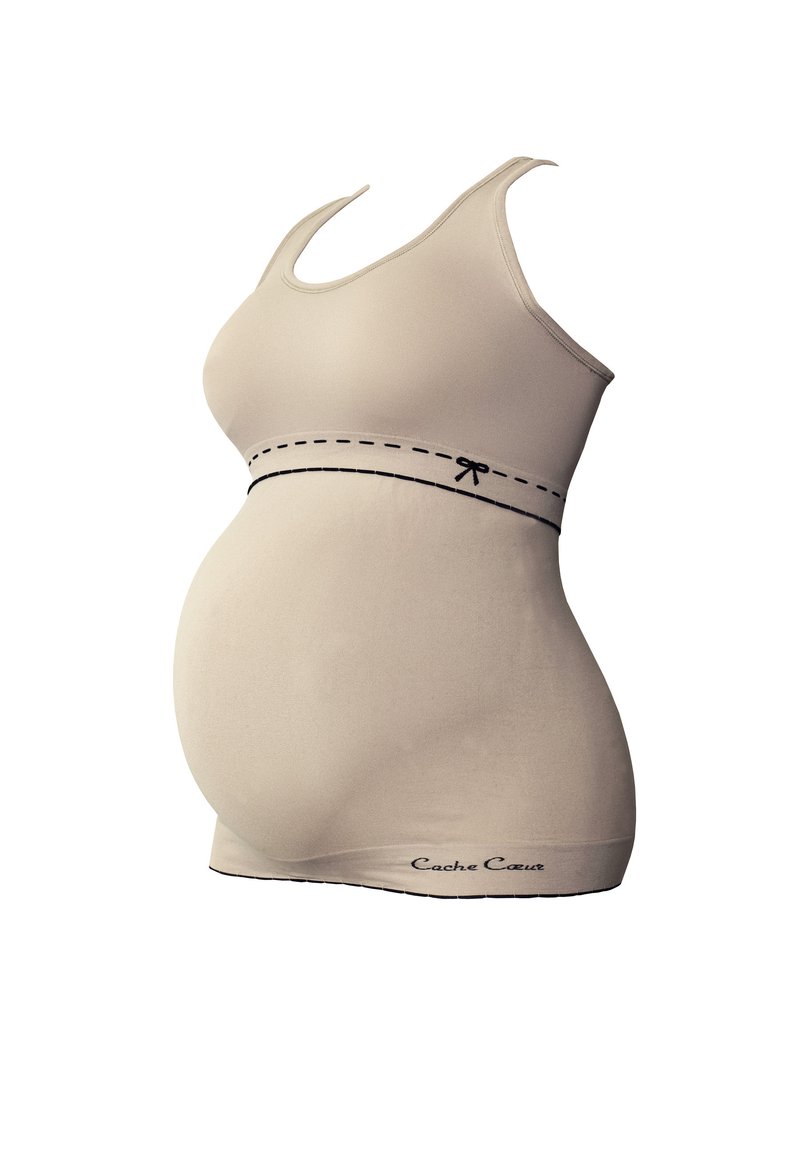 Beige zwangerschaps blouse, rekbare stof, ronde hals, decoratieve zwarte stiksels, strikaccent op de tailleband, getailleerde pasvorm, logo aan de onderrand.