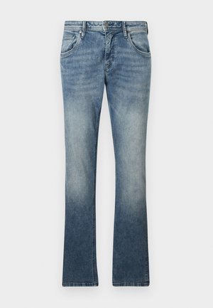 Jeans flare in denim azzurro chiaro con lavaggio sfumato, design a cinque tasche, chiusura con bottone in metallo e cuciture visibili lungo le cuciture.