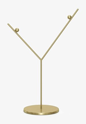 Goldfarbener Schmuckständer aus Metall mit runder Basis und schrägen Armen, der an den Enden zwei dekorative Kugeln bietet, um Accessoires zu präsentieren.
