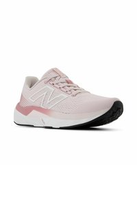 Light pink athletic shoe with a mesh upper, white logo, rubber sole, and subtle gradient from pink to white on the midsole.