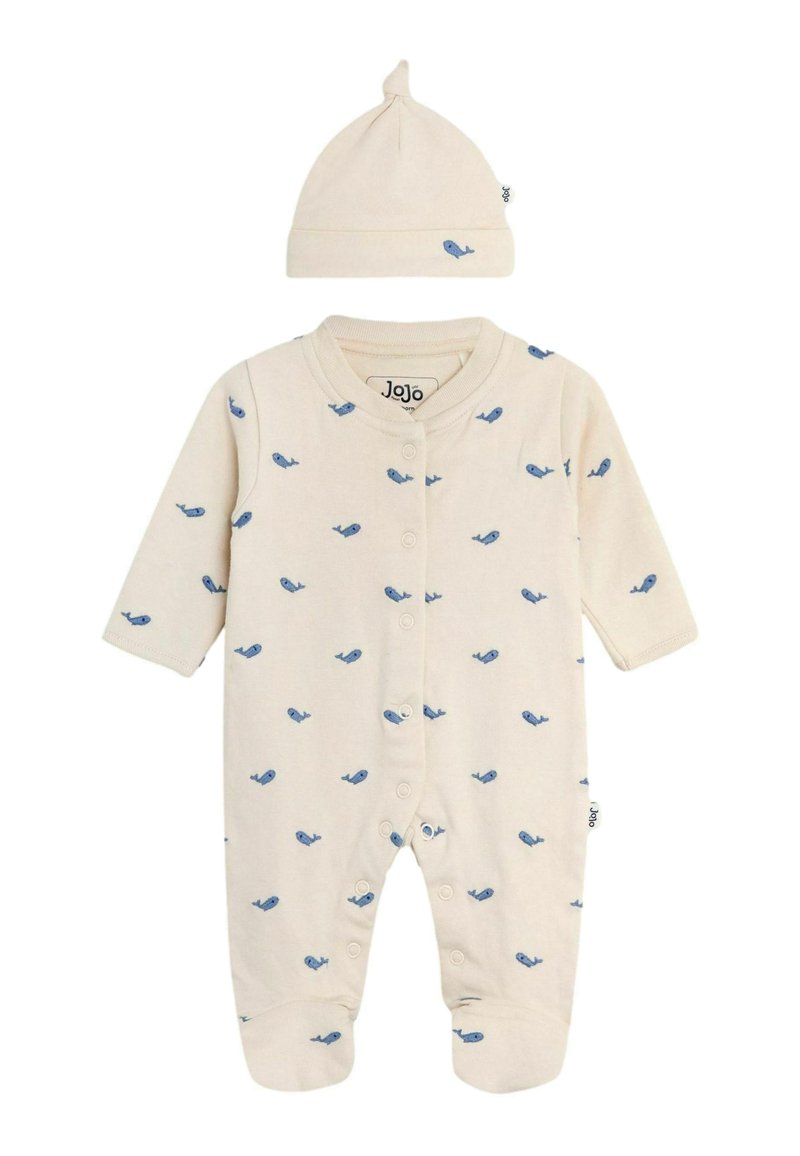 Conjunto de body y gorro en color crema, con patrones de ballenas azules, botones a presión y mangas largas. Material de algodón suave, amable con la piel.