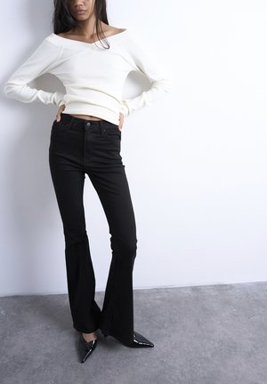 TSJAMIE - Flared jeans - black denim