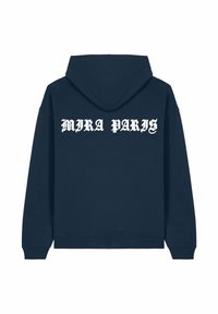 Marineblauwe hoodie met een trekkoordcapuchon en geribde manchetten. Heeft op de achterkant in vette, gestileerde letters de witte tekst "MIRA PARIS".
