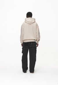 Pegador Sweat à capuche - sand