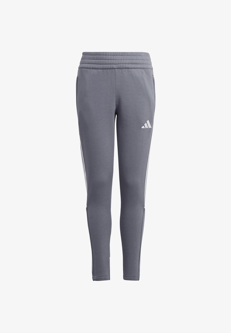 Pantalon de sport gris avec une taille côtelée, des jambes fuselées et des rayures blanches sur les côtés. Présente un logo en relief sur la cuisse gauche.
