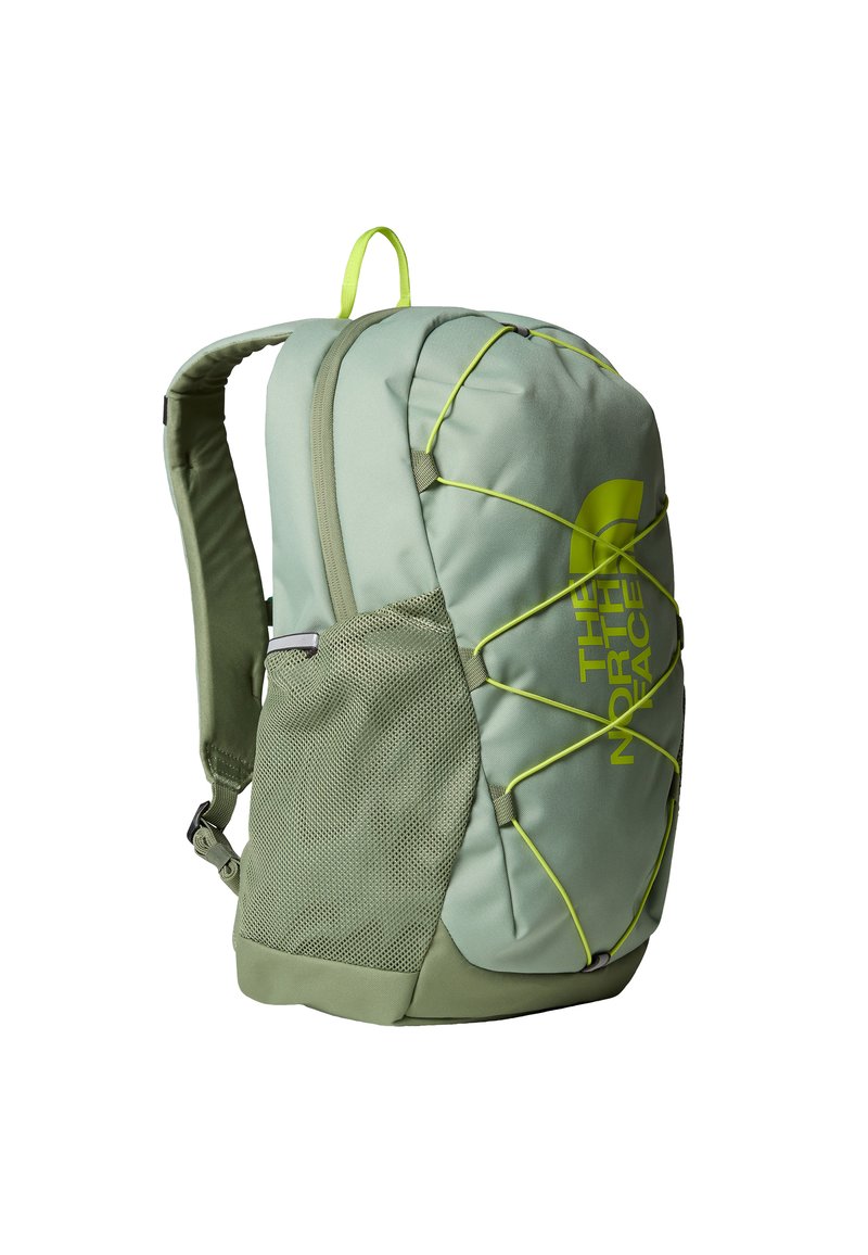 Green backpack featuring a textured mesh side pocket, elastic bungee cords, and a prominent yellow logo. Compartmentalized for organization.
