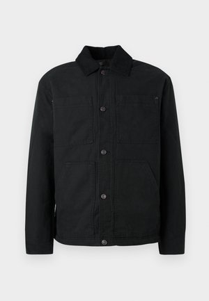 Schwarze Button-Up-Jacke mit Cordkragen und vier vorderen Taschen, präsentiert vor einem schlichten hellen Hintergrund.