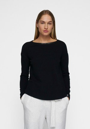 - Bluzka z długim rękawem