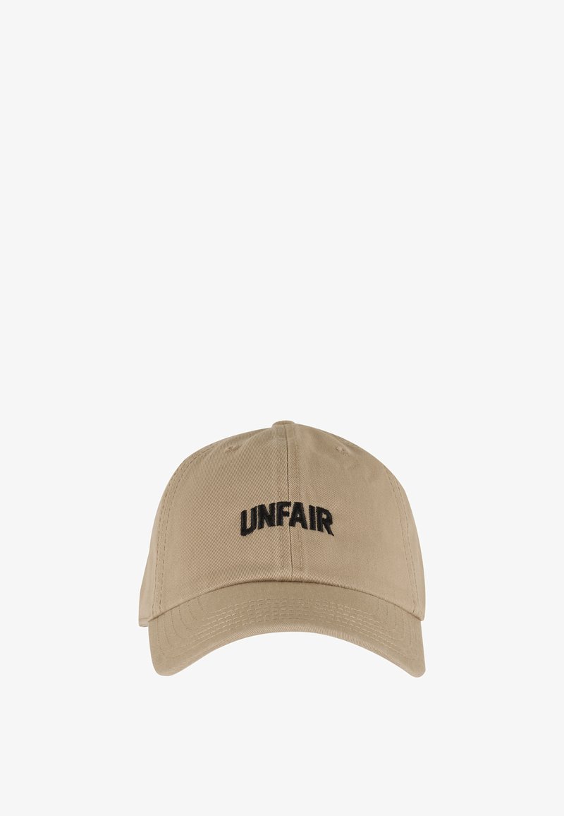 Beige baseball cap with curved brim and black embroidered text "UNFAIR" on the front center panel.