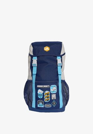 Marineblauer und grauer Rucksack mit hellblauen Trägern, Netzseitentaschen und Minecraft-Themen-Patches auf der Vordertasche.