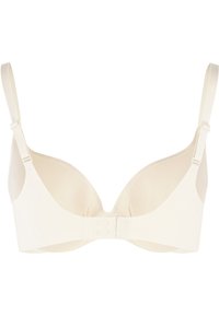 Beżowy stanik z formowanymi miseczkami, regulowanymi ramiączkami i zapięciem na haczyk. Gładki materiał, prosty design, bez ozdób.