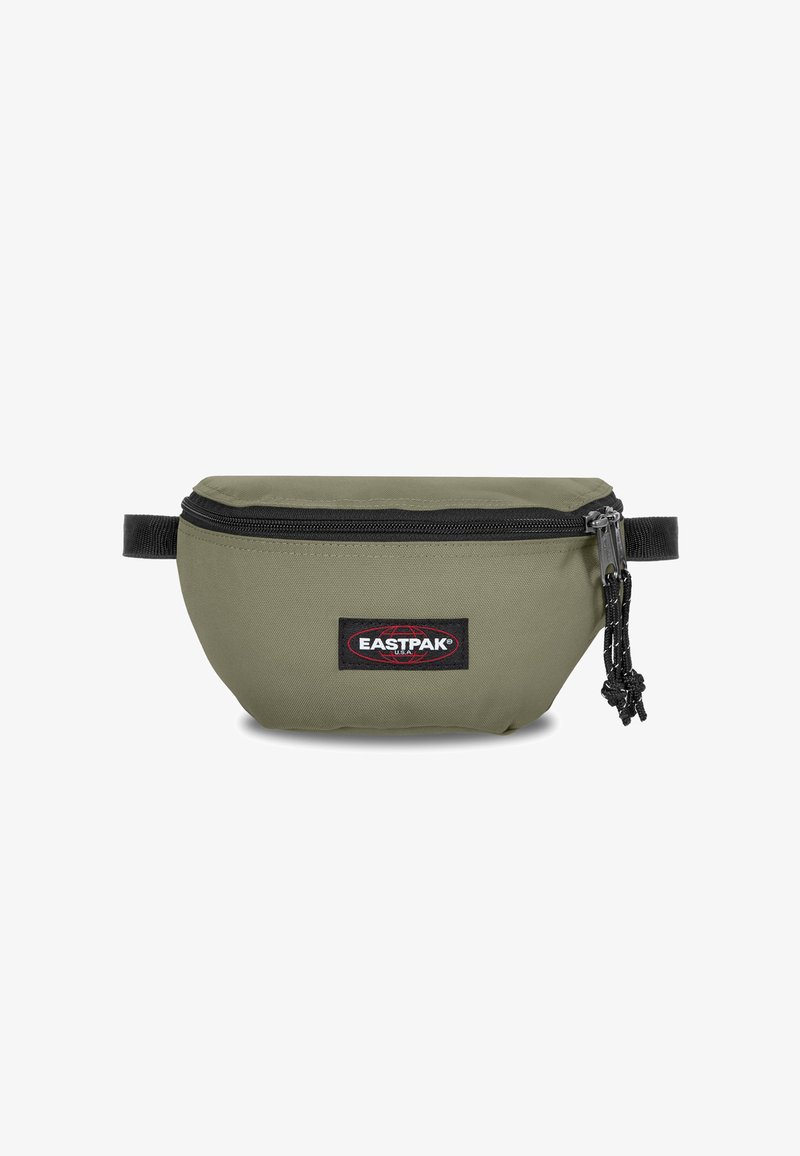 Marsupio Eastpak verde oliva realizzato in tessuto resistente, con chiusura a zip nera e patch con logo. Include una tracolla regolabile e una finitura testurizzata.