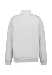 Grey sweatshirt with a high collar, ribbed cuffs, and hem. Made of soft fabric, featuring a simple, solid color without patterns or accents.