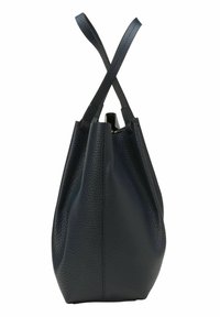 Sac en cuir noir texturé avec deux longues poignées croisées, présenté de profil sur un fond blanc.