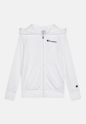 Balts zip-up kapucis jaka, izgatavota no mīkstas auduma, ar kapuci, priekšējām kabatām un izšūtu "Champion" logo uz krūškurvja un piedurknēm.